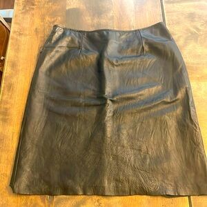 Women's black leather mini skirt size 10